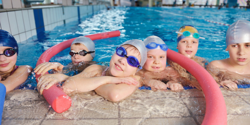 happy children group swimming pool 1